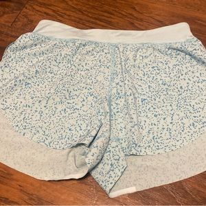 Light blue lululemon shorts size 8 with dark blue speaks never worn.